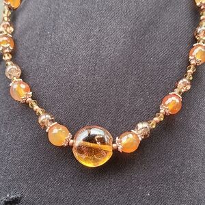 Handspun glass and Carnelian crystal necklace.  Adjustable,  handmade.